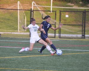 Freshman Megan Hatfield fought to win the ball in Bears’ territory.