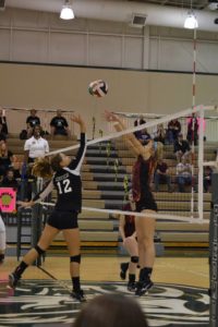 Junior Jennifer Opper pushes the ball over the net for the Lady Lions in Sunday’s match over Maryville.