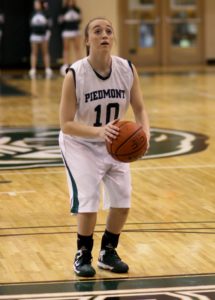 Sophomore Talyor Swoszowski shoots for the free throw in a game last season